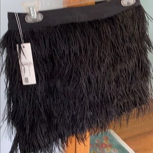 Gracia  feather skirt really sassy